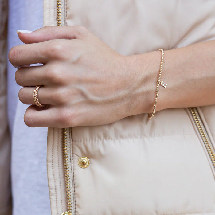 classic gold 2mm bead bracelet - respect gold charm