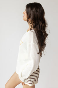 mode, sunny days club sweater