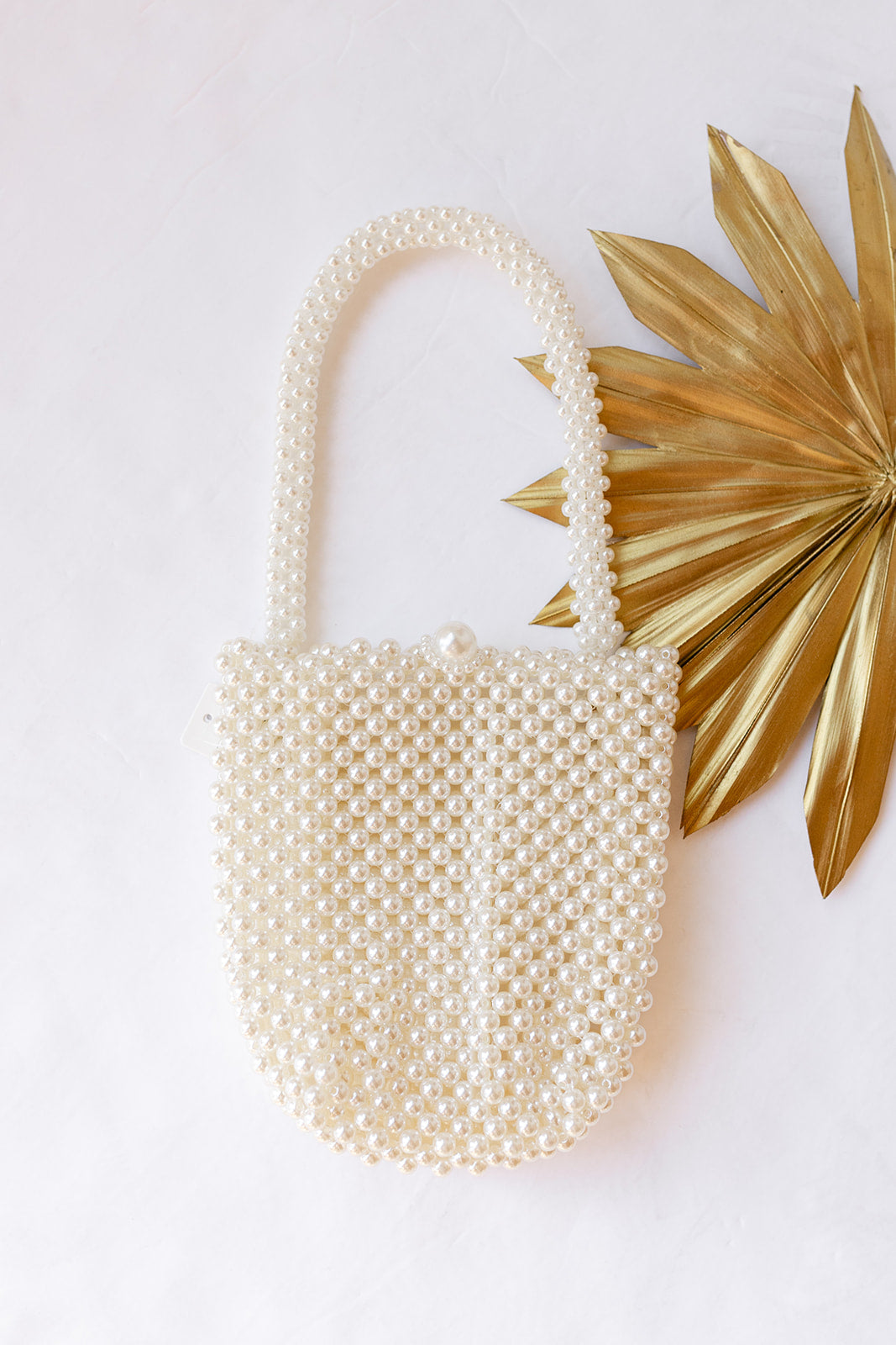 mode, classic pearl bucket bag