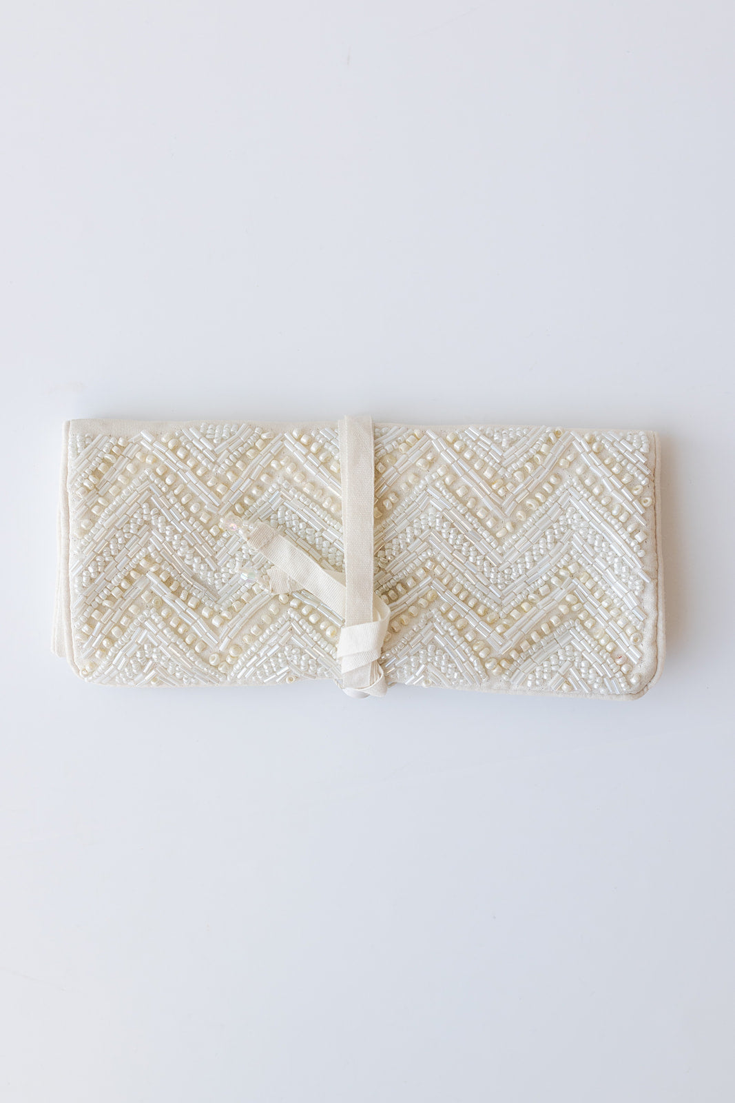 mode, jewelry roll, ivory