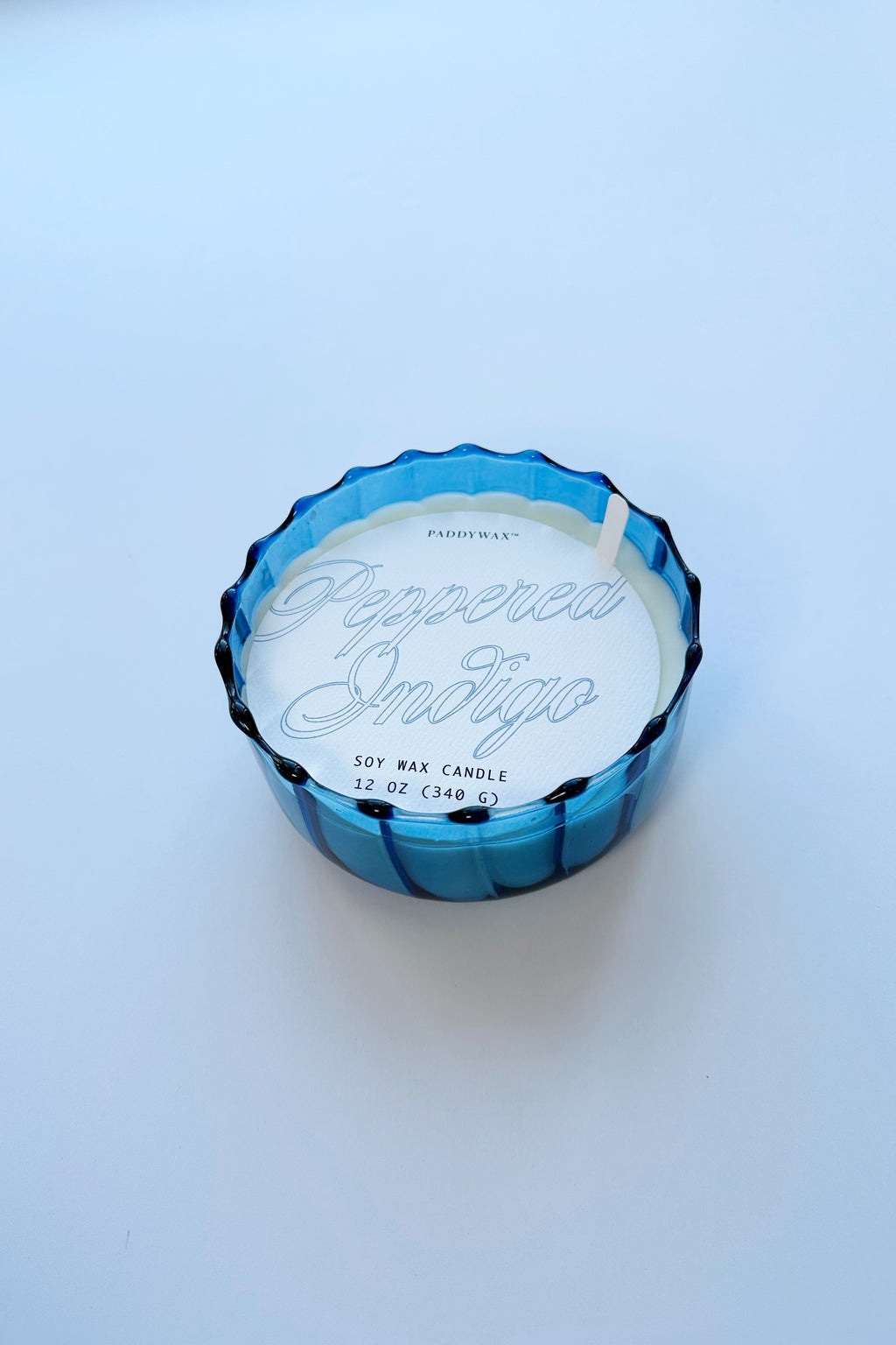 mode, 12 oz ribbed glass candle, peppered indigo