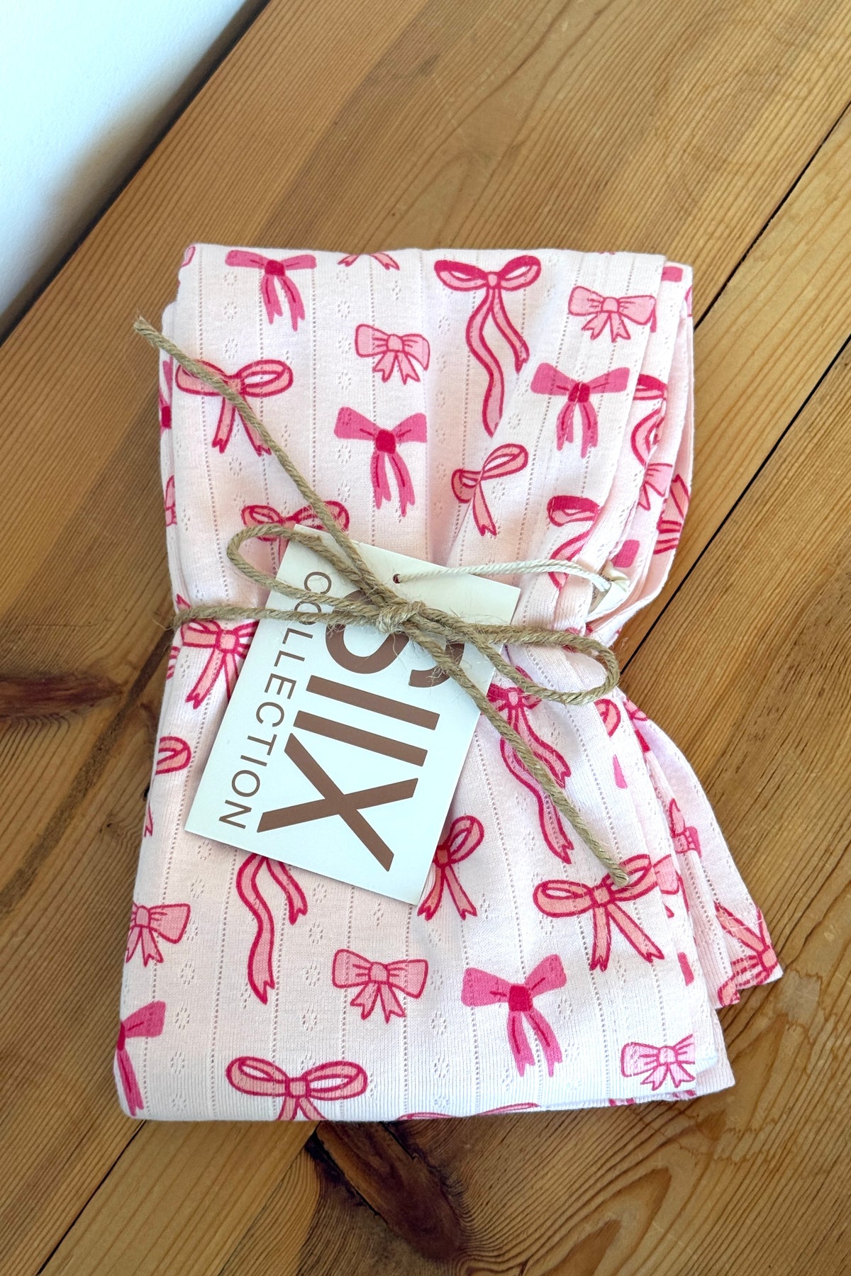 pink bows organic pointelle swaddle