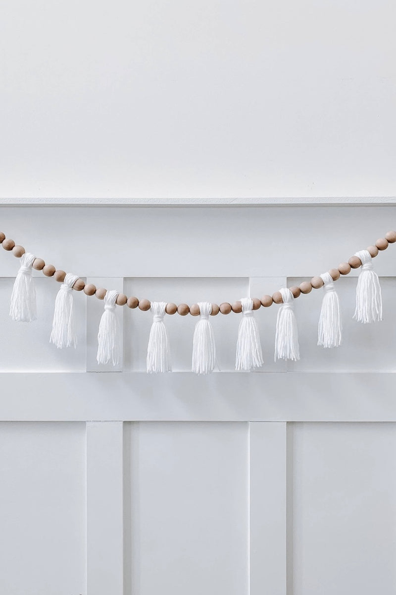 mode, wood beaded garland w yarn tassels