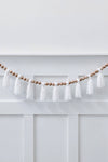 mode, wood beaded garland w yarn tassels