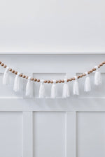 mode, wood beaded garland w yarn tassels