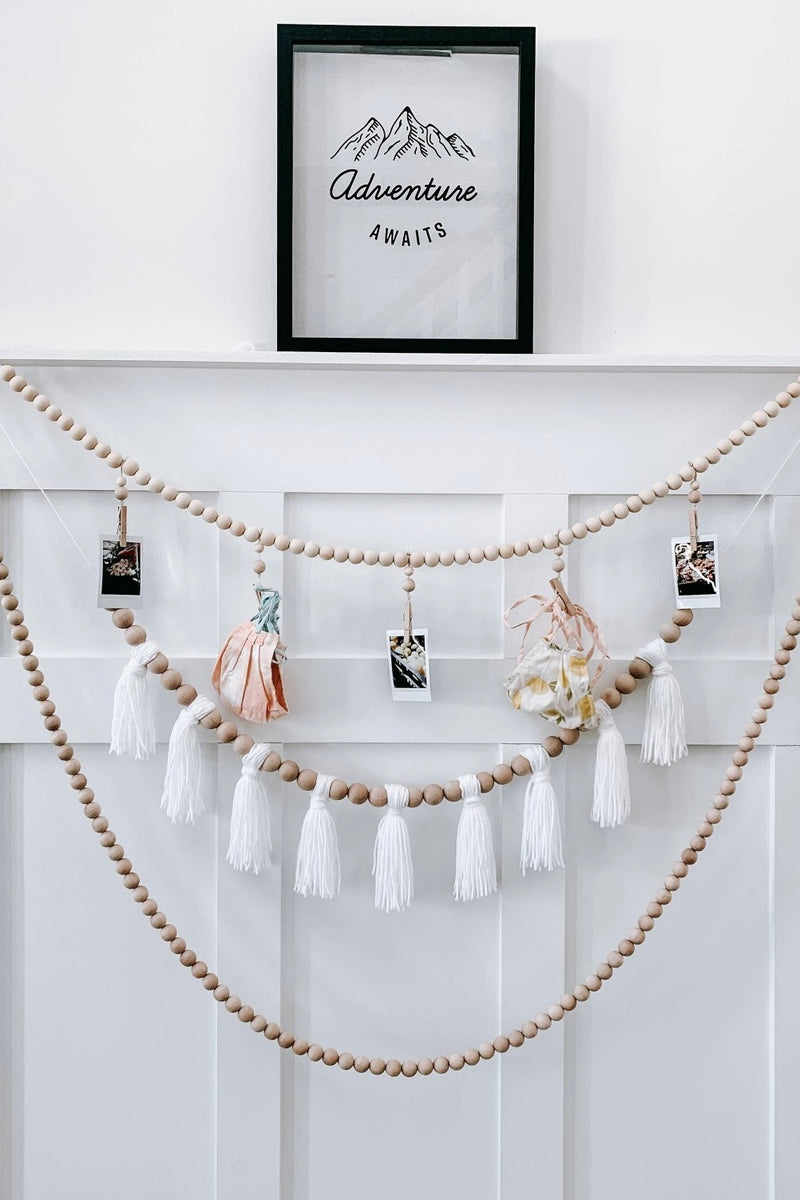 mode, wood beaded garland w yarn tassels