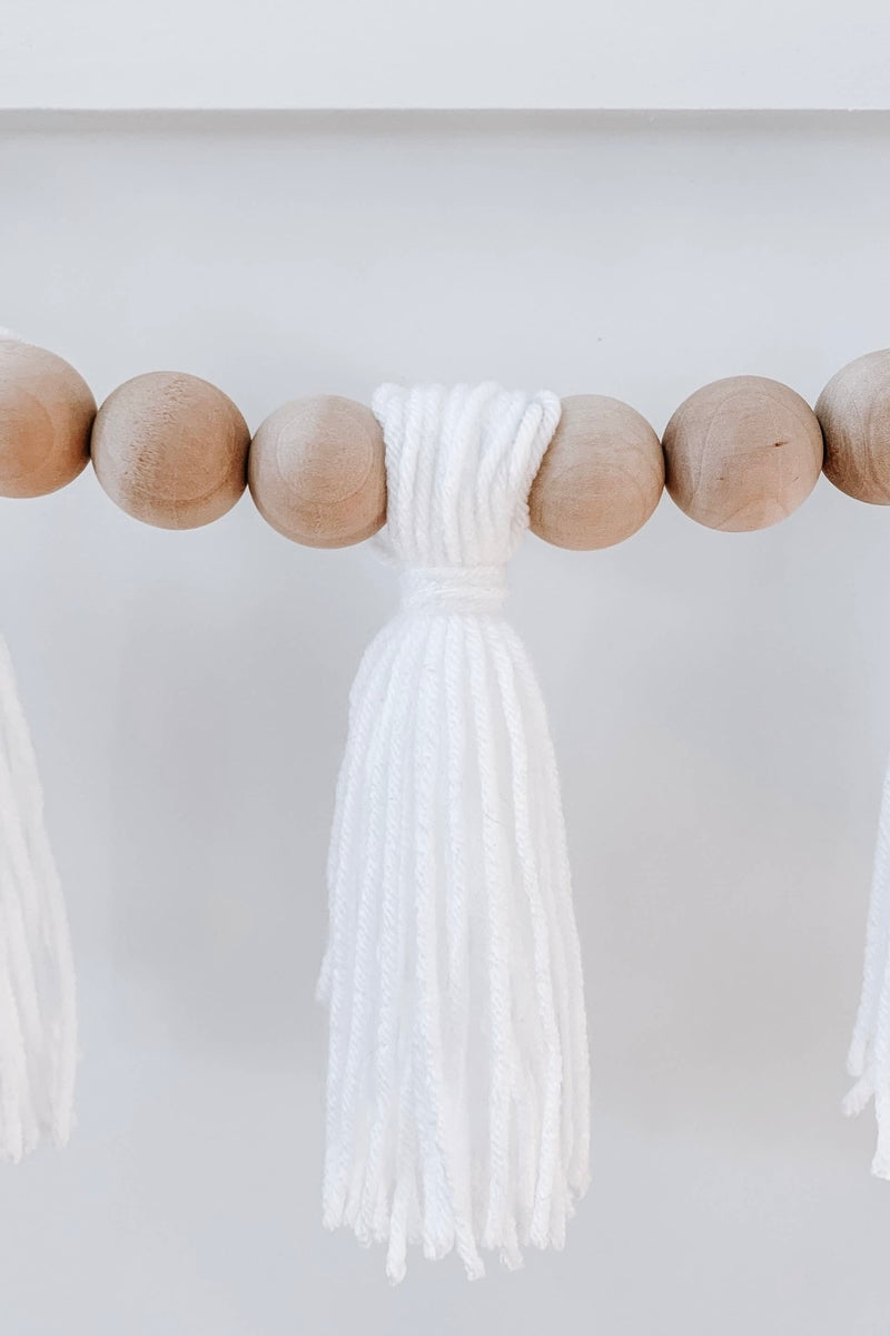 mode, wood beaded garland w yarn tassels