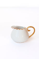 scalloped vintage creamer vase