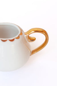 scalloped vintage creamer vase