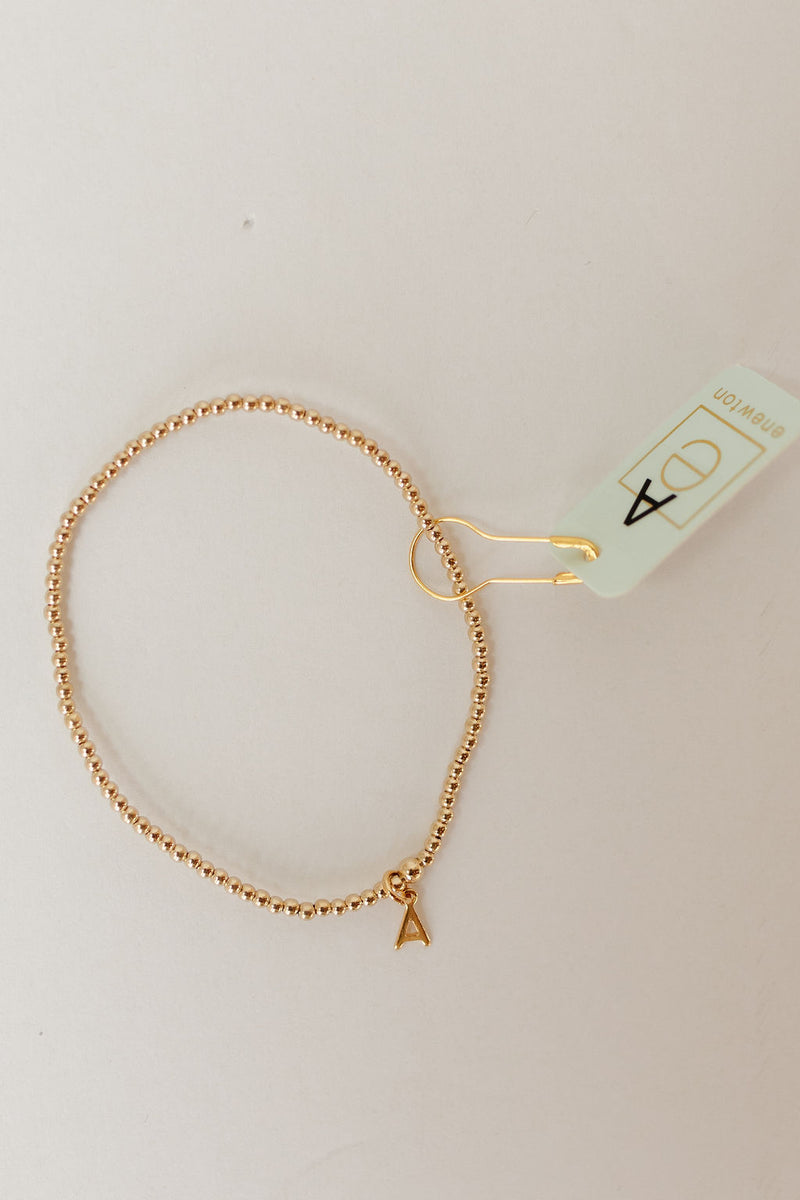 classic gold 2mm bead bracelet - respect gold charm