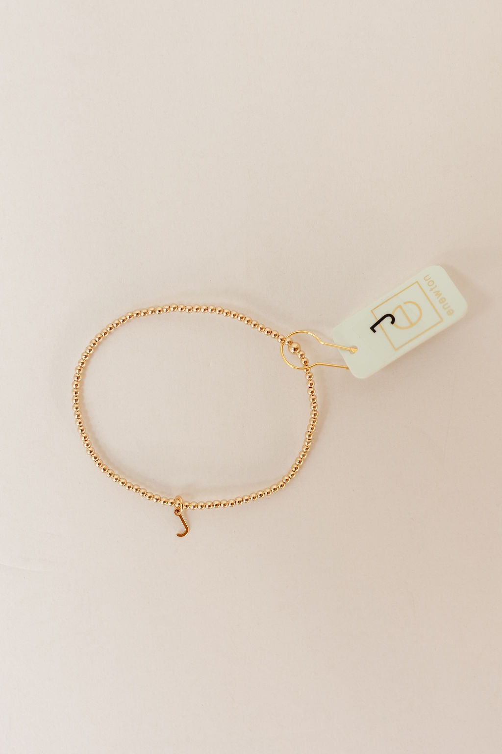 classic gold 2mm bead bracelet - respect gold charm
