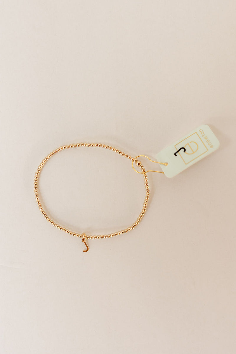classic gold 2mm bead bracelet - respect gold charm