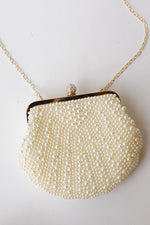 she's a pearl clutch