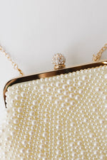 she's a pearl clutch