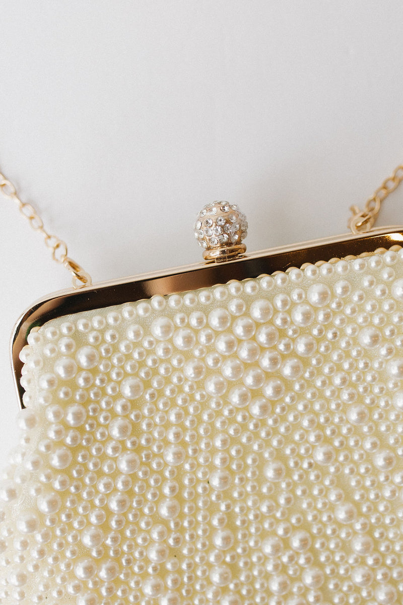 she's a pearl clutch