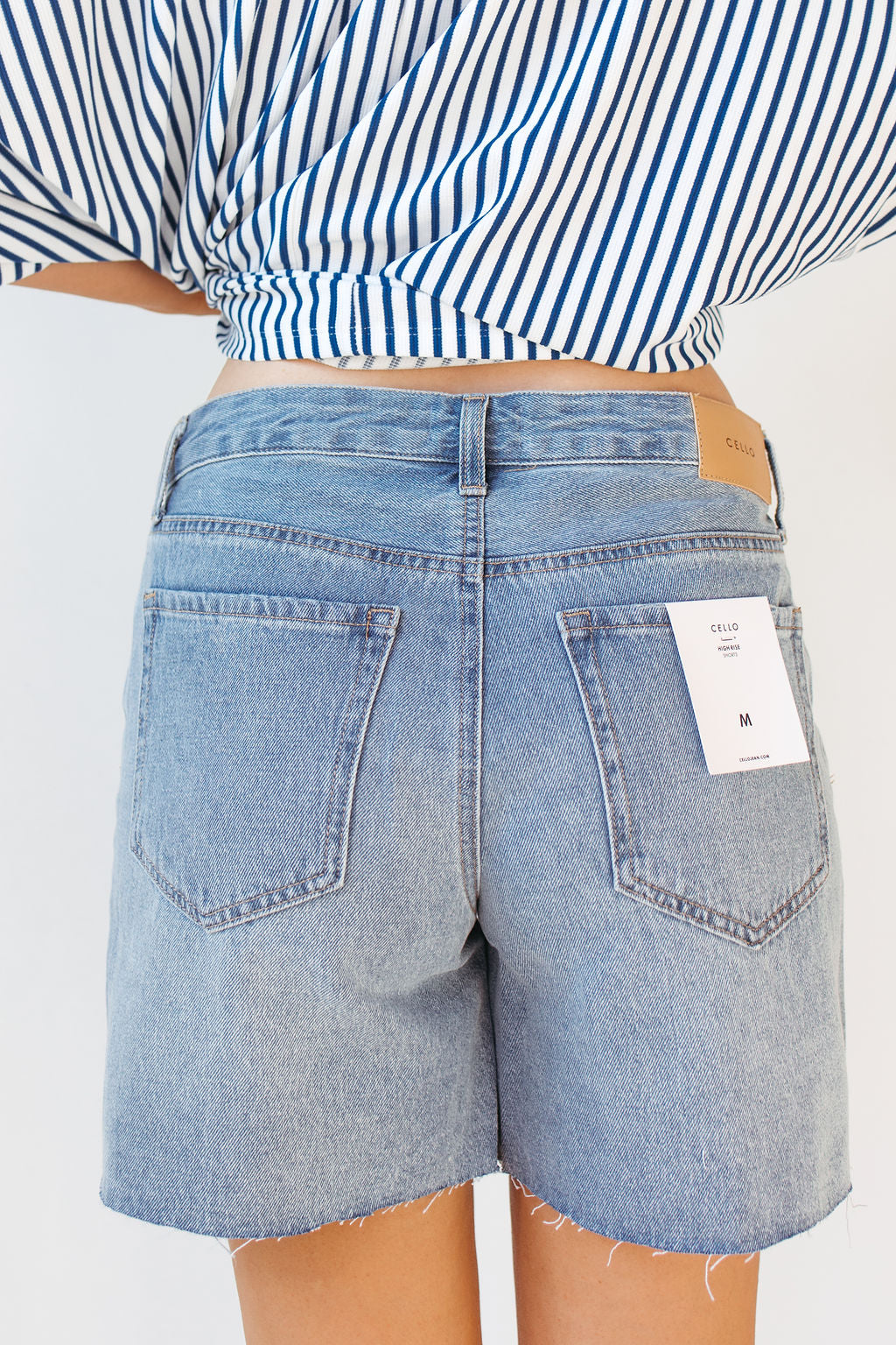 clare high rise mid-thigh denim shorts