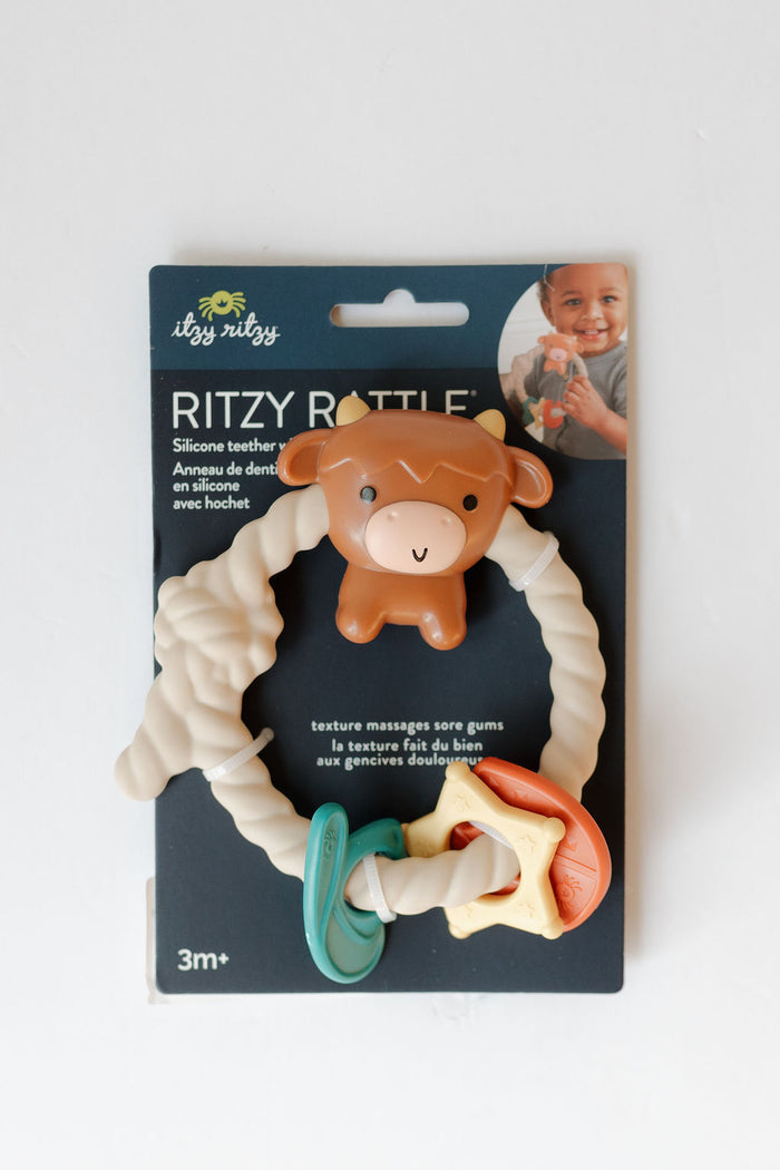 ritzy rattle silicone teether - highland cow