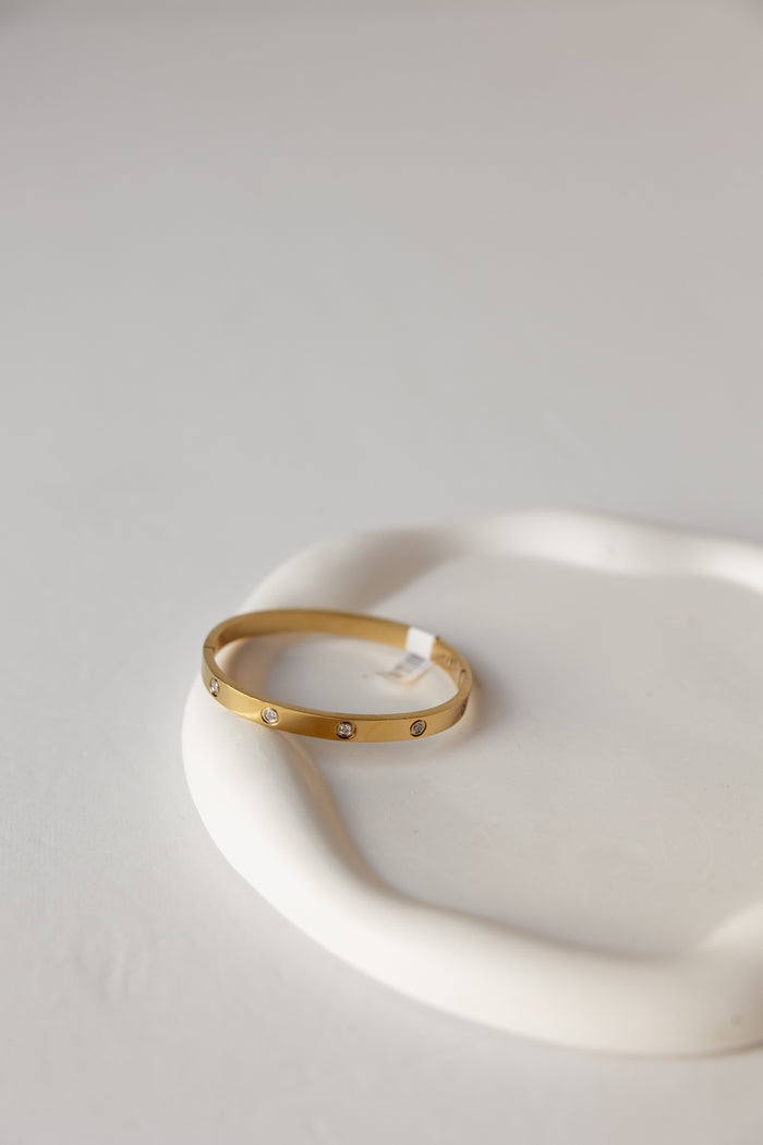 corinne gold bangle bracelet