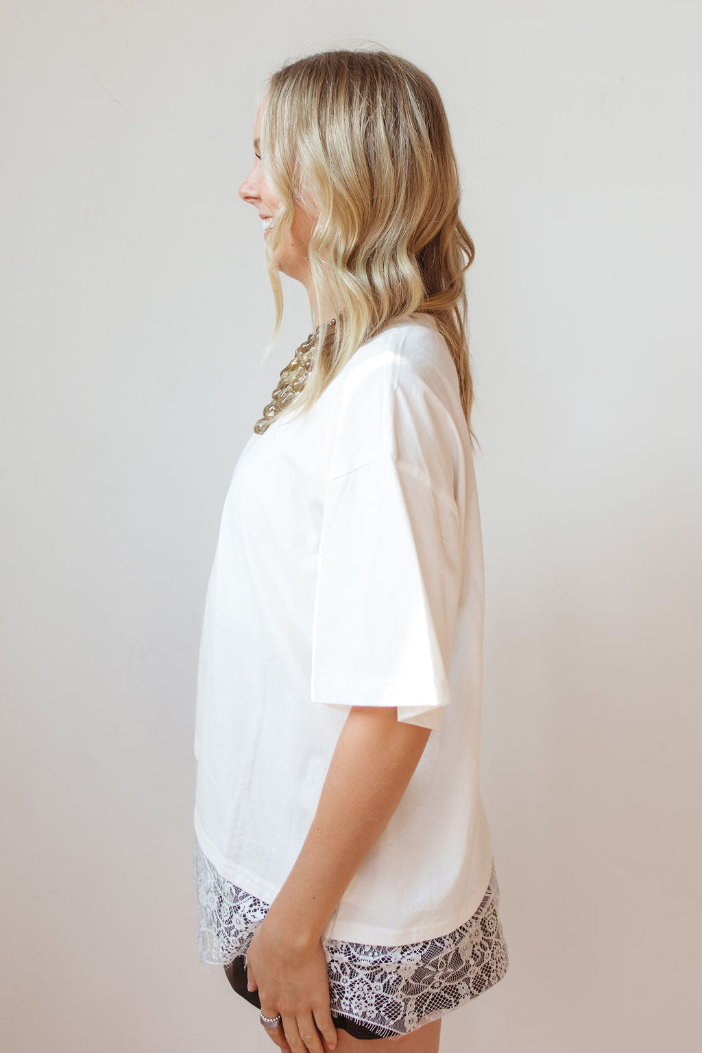 sloan floral lace asymmetrical tee