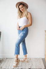 mode, high rise uneven hem crop flare