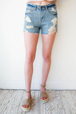 mode, in the clear destroyed denim shorts