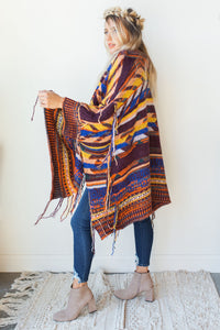 mode, follow the arrow poncho