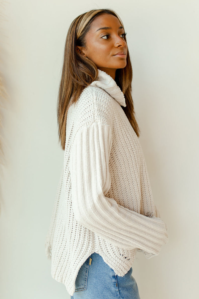 mode, the only one distressed turtleneck