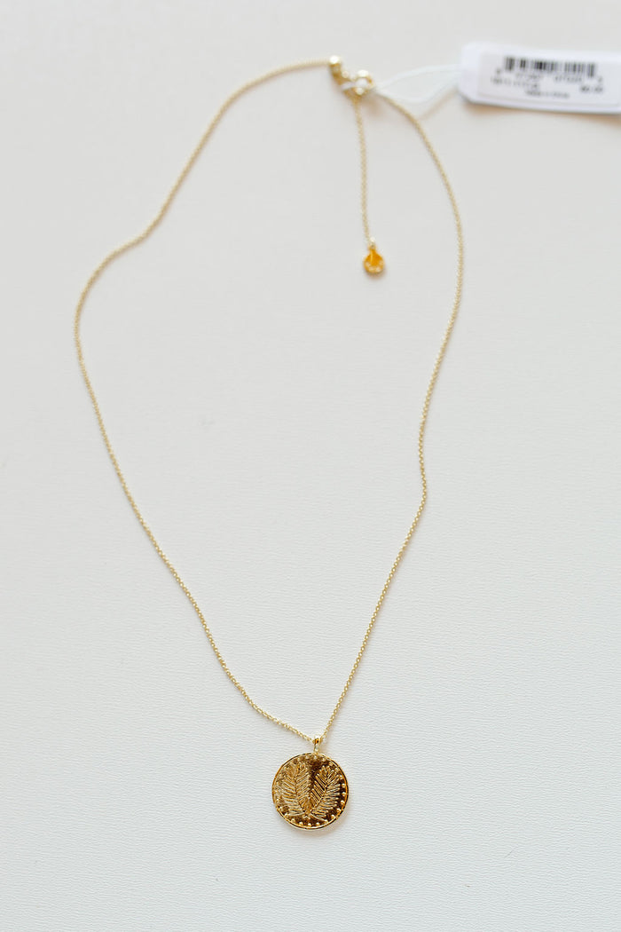 mode, palm coin necklace