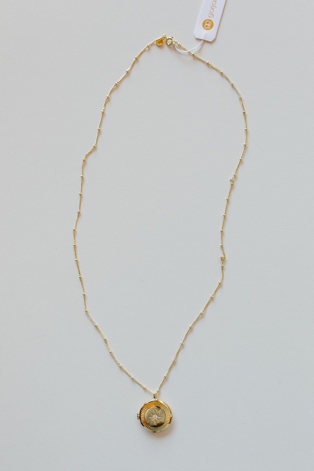 mode, stellar locket necklace