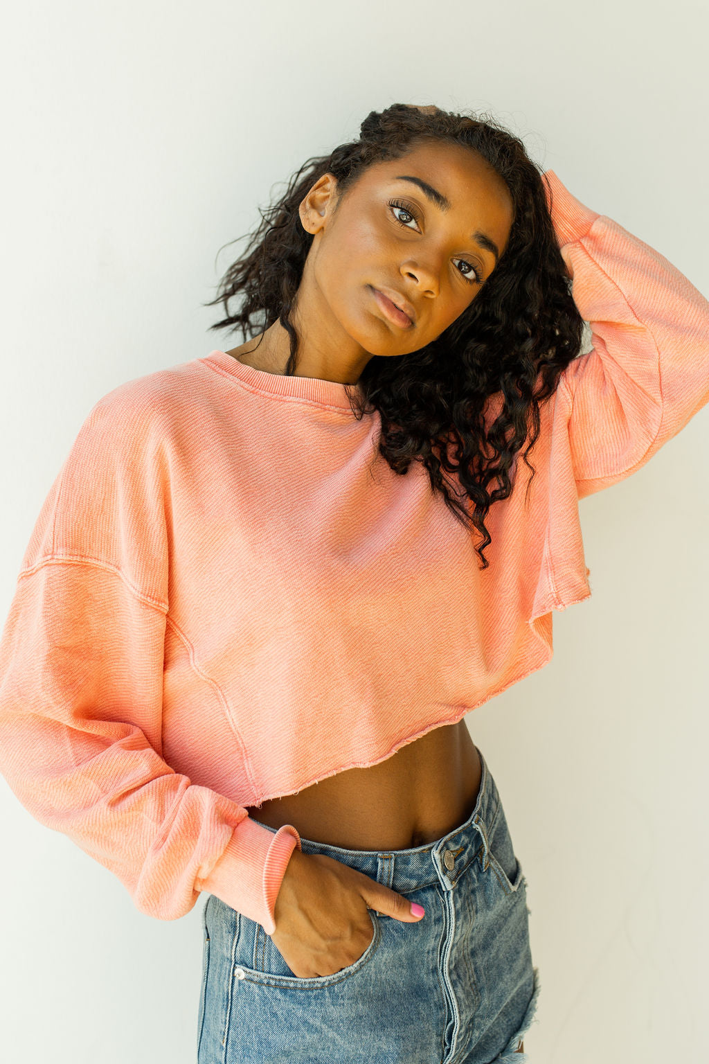 mode, in the raw cropped sweater