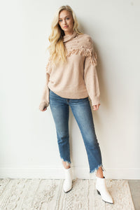 mode, pom pom + fringe combo sweater