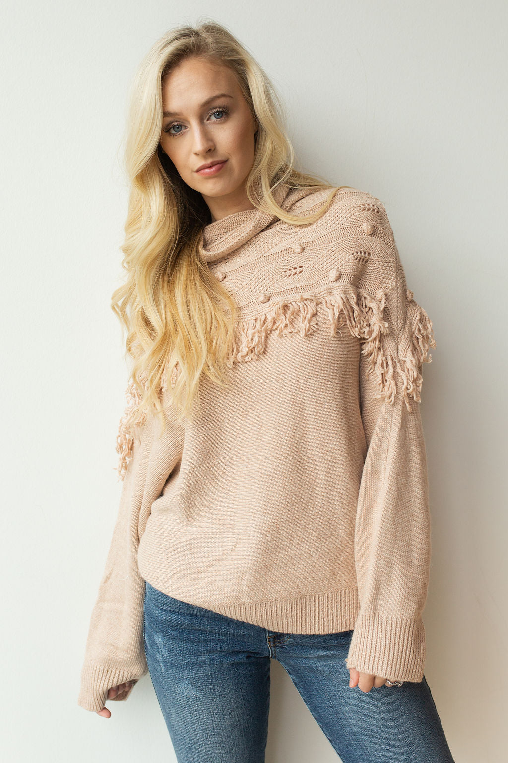 mode, pom pom + fringe combo sweater