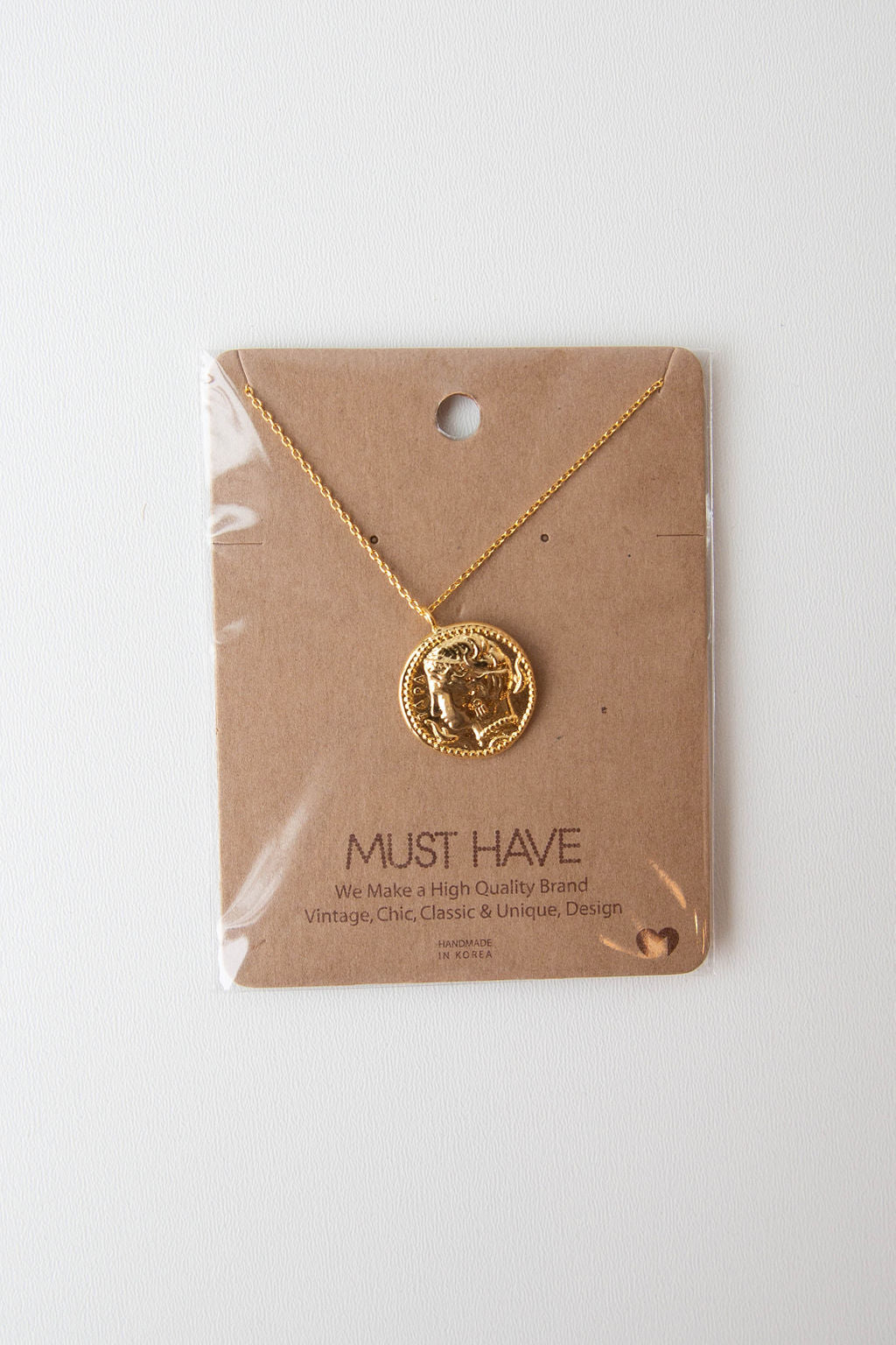 mode, lucky coin necklace