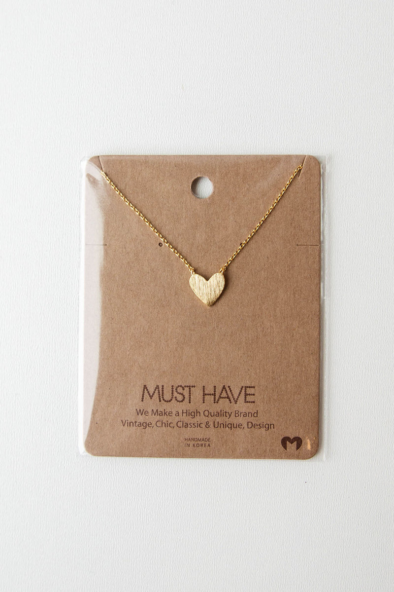mode, heart of gold necklace