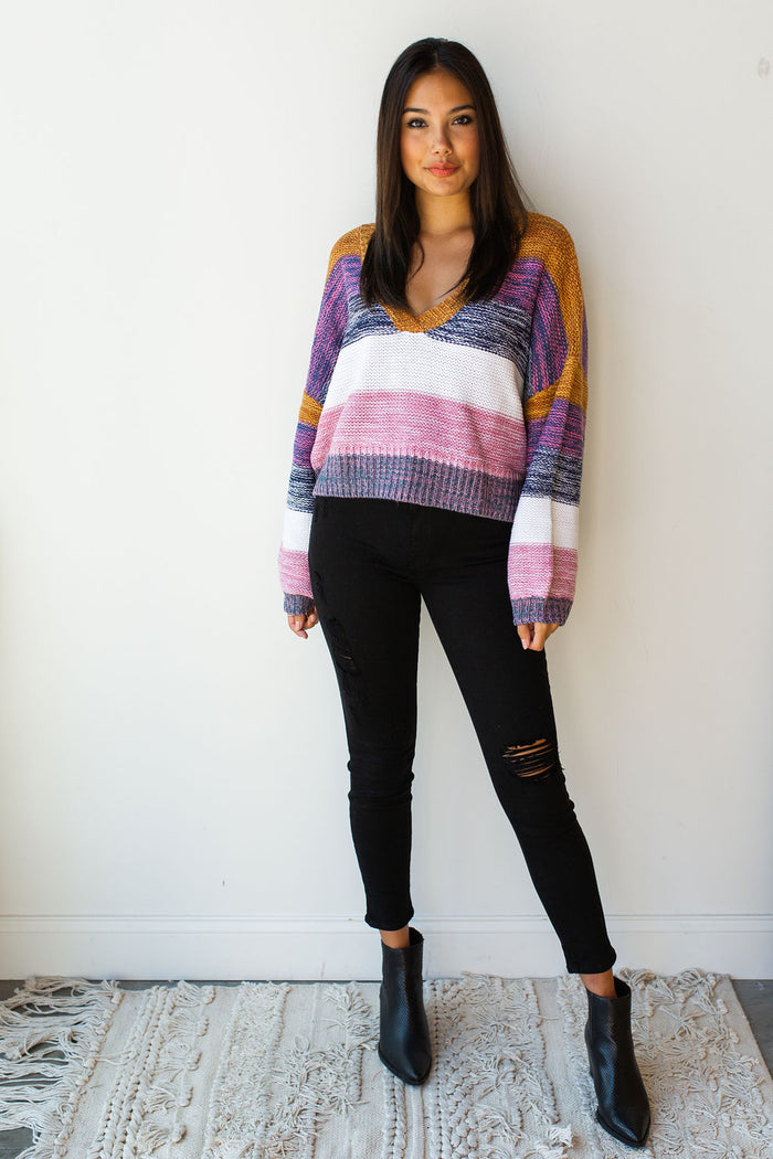 mode, line of color v neck sweater