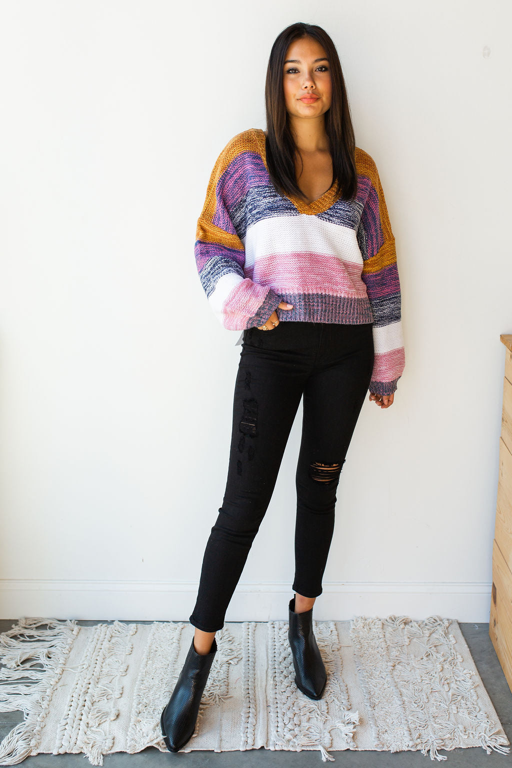 mode, line of color v neck sweater