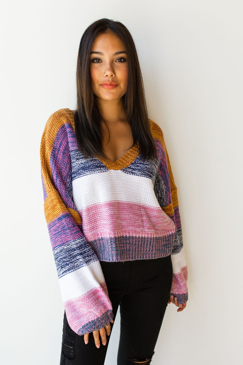 mode, line of color v neck sweater