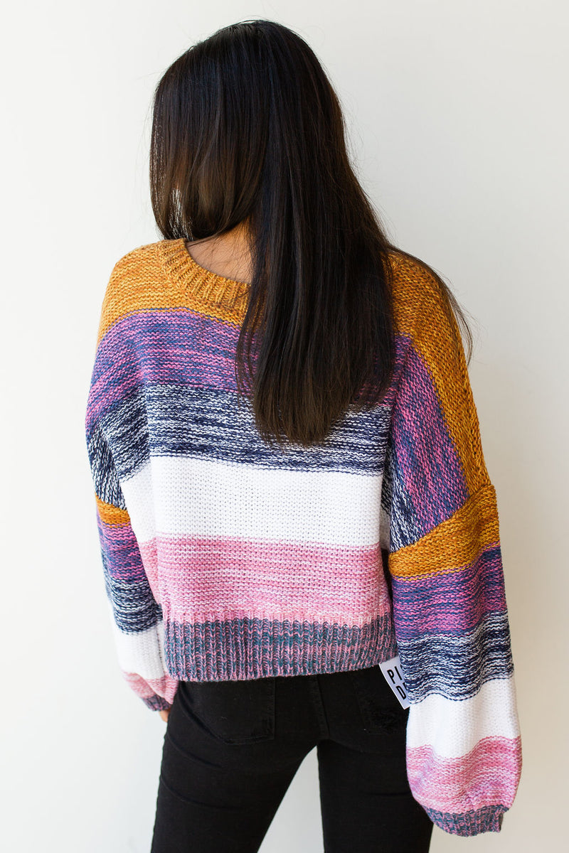mode, line of color v neck sweater
