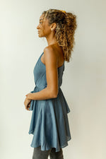 mode, one shoulder peplum flow top