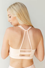 mode, knotted outline racerback sports bra