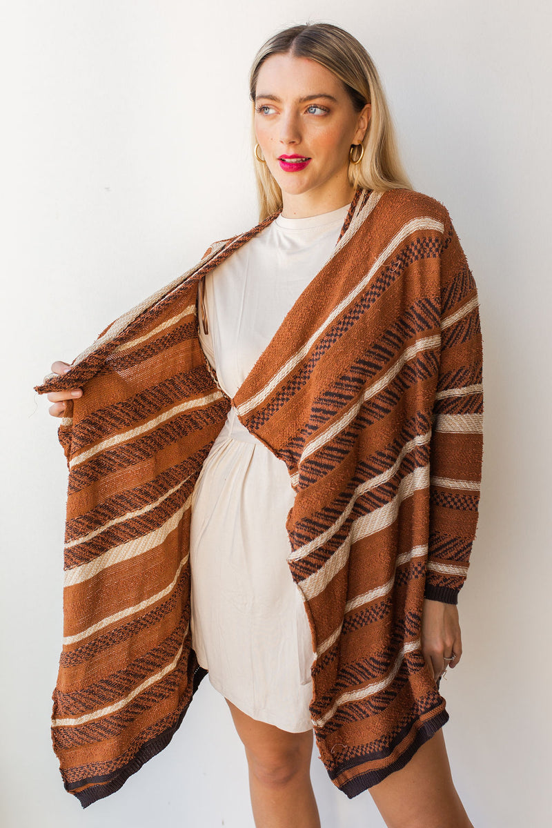 mode, weight's lifted open cardi