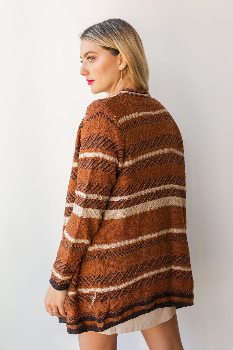 mode, weight's lifted open cardi