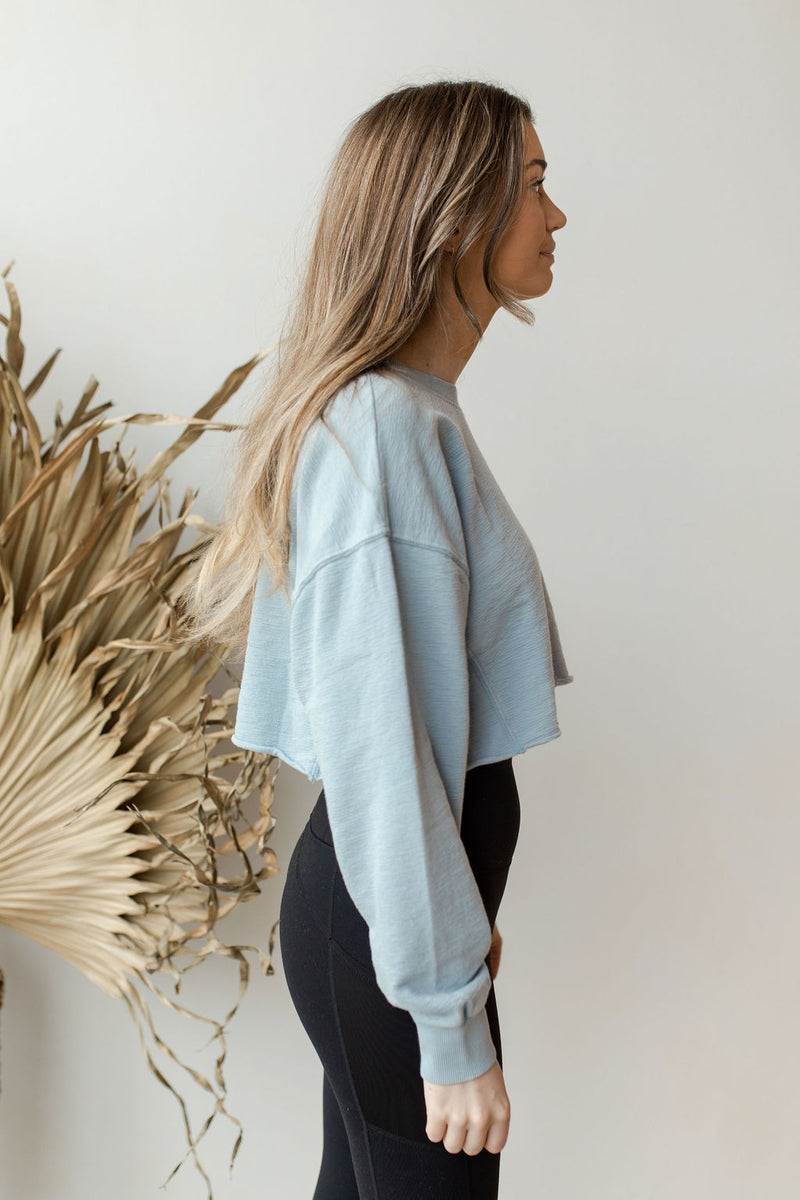 mode, in the raw cropped sweater