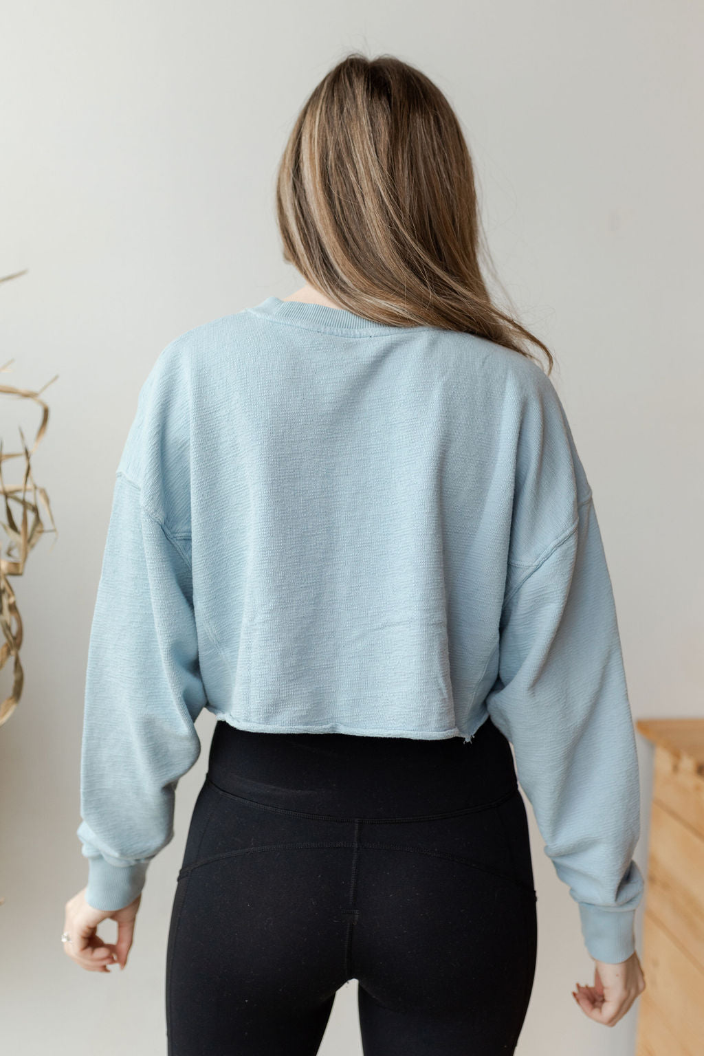 mode, in the raw cropped sweater