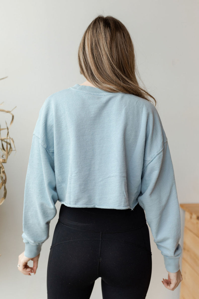 mode, in the raw cropped sweater