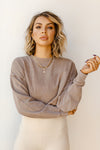 mode, in the raw cropped sweater