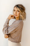 mode, in the raw cropped sweater
