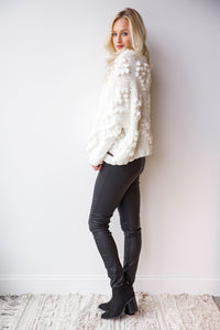 mode, pop the bubbly sweater