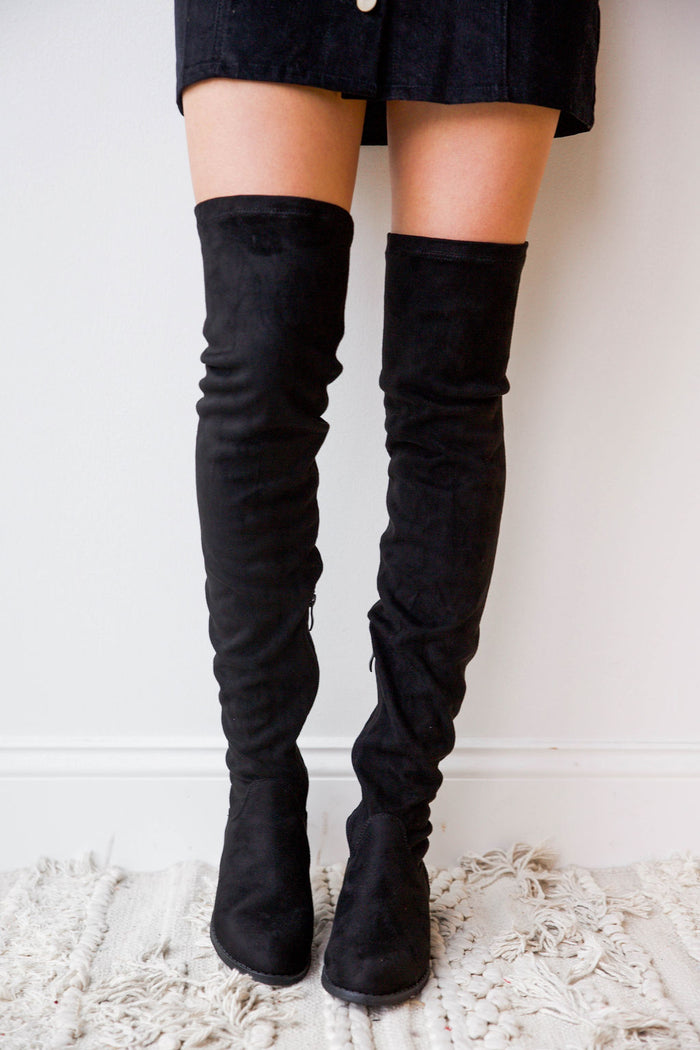 mode, hand up over the knee boot