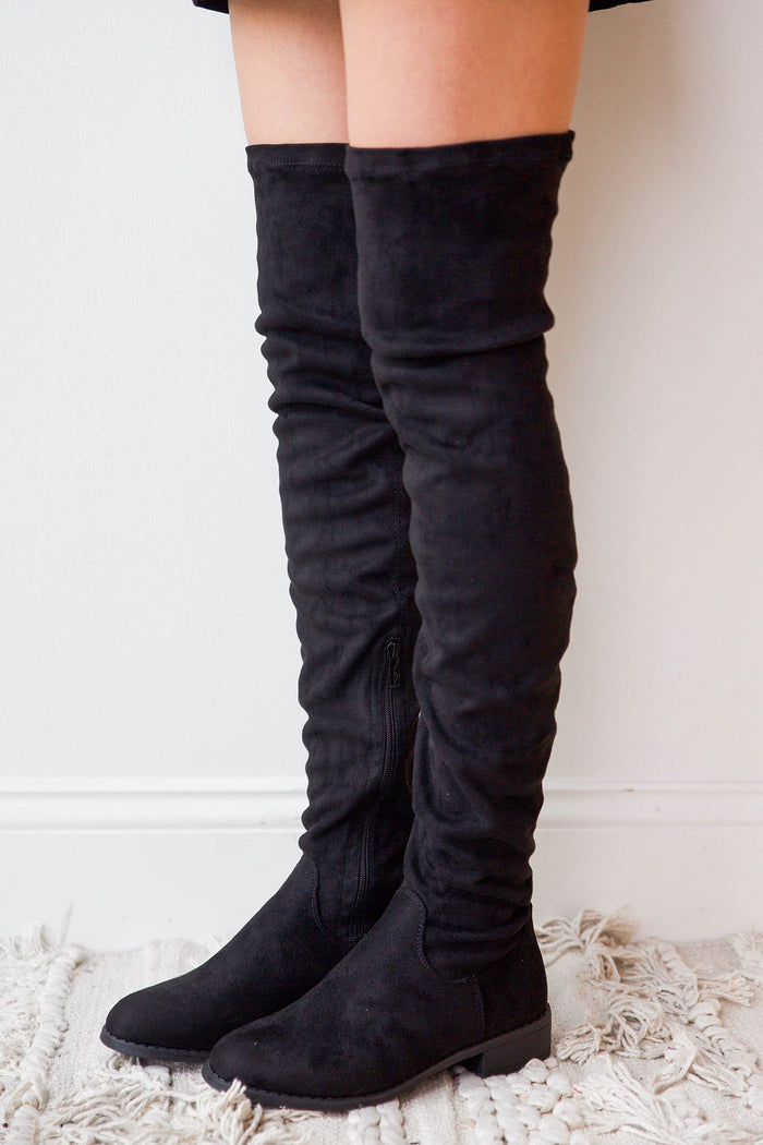 mode, hand up over the knee boot